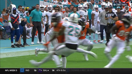 Rodgers signs ball intercepted by Dolphins' Kohou