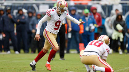 Punter (18) Mitch Wishnowsky of the San Francisco 49ers punts against the  Los Angeles Rams in