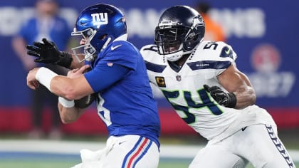 Seattle Seahawks linebacker Bobby Wagner loops around the edge for a sack  of New York Giants quarterback Daniel Jones