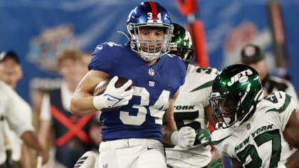 New York Giants running back Sandro Platzgummer (34) runs with the