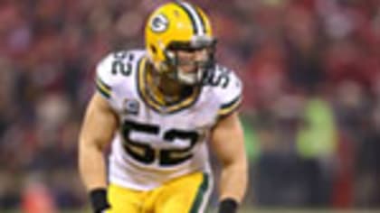 Green Bay Packers linebacker Clay Matthews stands on the field during warm  ups before the game