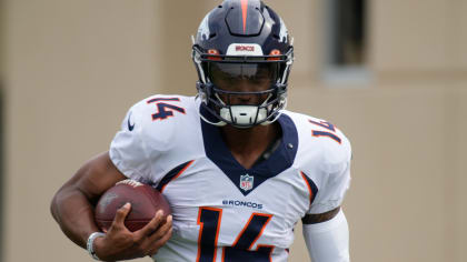 NFL Network reporter James Palmer on the field before an NFL