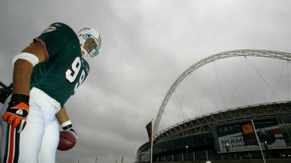 An oversized animatronic of Dolphins defensive end Jason Taylor looms near Wembley Stadium before the New York Giants and Miami Dolphins inaugurated the International Series in London in 2007. (Kristy Wigglesworth/Associated Press)