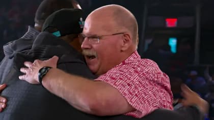 Kansas City Chiefs Head Coach Andy Reid embraces the Philadelphia Eagles  players he used to coach in Philly on 'Super Bowl Opening Night'
