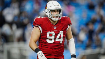 Arizona Cardinals defensive end Zach Allen engulfs New England Patriots  quarterback Mac Jones with some force for 10-yard sack