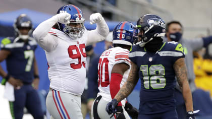 New York Giants linebacker Carter Coughlin (52) warms up before an NFL  football game against the Dallas Cowboys, Sunday, Oct. 10, 2021, in  Arlington, Texas. Dallas won 44-20. (AP Photo/Brandon Wade Stock Photo -  Alamy