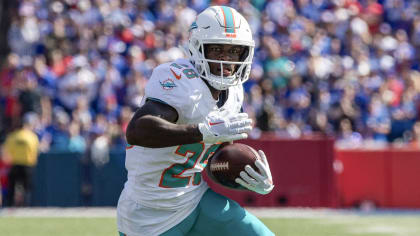 Running back Sammie Smith of the Miami Dolphins runs with the ball