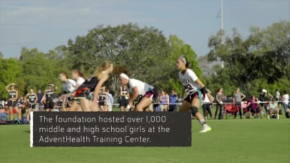 Children involved with Play 60 run onto the field to participate in a game  of flag football during half time of a preseason NFL football game between  the Tampa Bay Buccaneers and