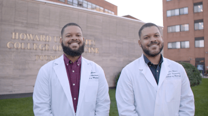 KU med student Patrick Baki working with Kansas City Chiefs