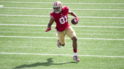 San Francisco 49ers tight end Jordan Reed wears a logo for Salute