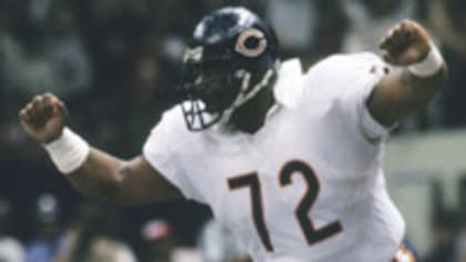 Chicago Bears running back Neal Anderson carries the football and