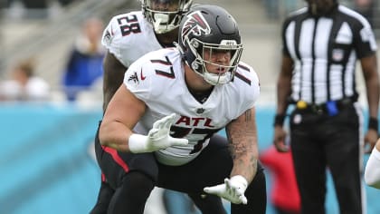 Atlanta Falcons offensive tackle Jalen Mayfield (77) works during