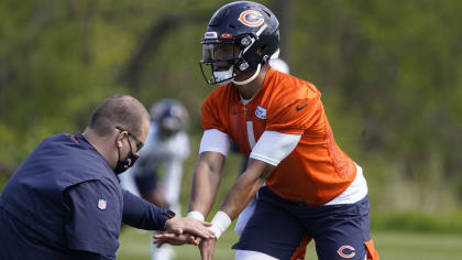 Darnell Mooney of the Chicago Bears moves around Kevin King of the