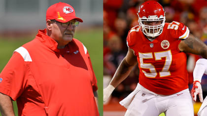 Kansas City Chiefs head coach Andy Reid watches a game replay while holding  the challenge flag …