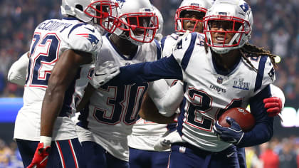 New England Patriots' dominant defense tames Giants to stay