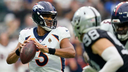 Denver Broncos quarterback Russell Wilson (3) calls a play against the  Indianapolis Colts during the second half of an NFL football game,  Thursday, Oct. 6, 2022, in Denver. (AP Photo/David Zalubowski Stock