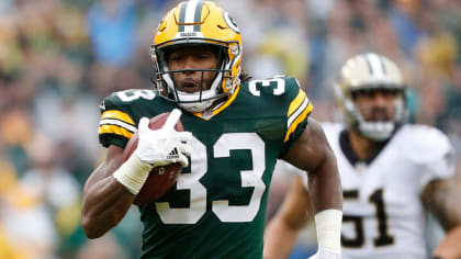 RB Aaron Jones staying with Packers under restructured deal - The San Diego  Union-Tribune