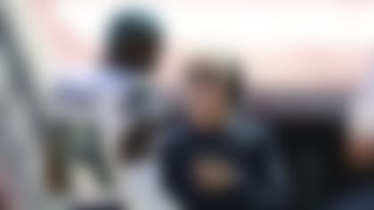 Seattle Seahawks wide receiver DK Metcalf (14) talks with head coach Pete Carroll during the first half of an NFL football game against the San Francisco 49ers in Santa Clara, Calif., Sunday, Oct. 3, 2021. (AP Photo/Jed Jacobsohn)