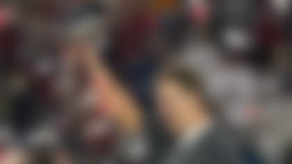 FILE - In this Feb. 7, 2021, file photo, Tampa Bay Buccaneers quarterback Tom Brady celebrates with the Vince Lombardi Trophy after the team's NFL Super Bowl 55 football game against the Kansas City Chiefs in Tampa, Fla. Tom Brady has retired after winning seven Super Bowls and setting numerous passing records in an unprecedented 22-year-career. He made the announcement, Tuesday, Feb. 1, 2022, in a long post on Instagram.  (AP Photo/Lynne Sladky, File)