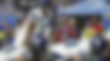 Seattle Seahawks quarterback Geno Smith (7) gets set tto run a play against the Detroit Lions in the first half an NFL football game at Ford Field in Detroit, Sunday, Sept. 17, 2023. (AP Photo/Rick Osentoski)