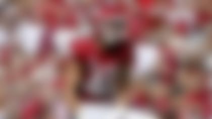 Arkansas linebacker Drew Sanders (42) celebrates after making a big play against Cincinnati during the first half of an NCAA college football game Saturday, Sept. 3, 2022, in Fayetteville, Ark. (AP Photo/Michael Woods)