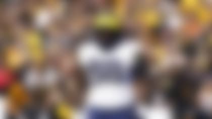 Michigan defensive lineman Mazi Smith stands on the field during the first half of an NCAA college football game against Iowa, Saturday, Oct. 1, 2022, in Iowa City, Iowa. (AP Photo/Charlie Neibergall)