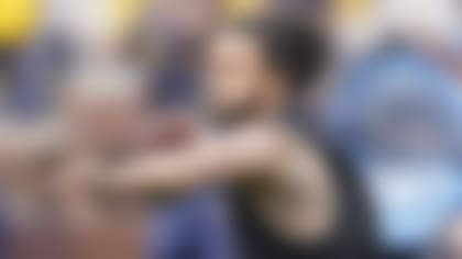 Former NFL quarterback Colin Kaepernick throws during halftime of an NCAA college football intra-squad spring game, Saturday, April 2, 2022, in Ann Arbor, Mich. (AP Photo/Carlos Osorio)Colin Rand Kaepernick