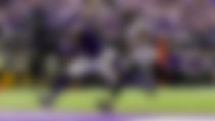 Minnesota Vikings wide receiver Jordan Addison, left, catches a 39-yard touchdown pass in front of Tampa Bay Buccaneers safety Ryan Neal during the first half of an NFL football game, Sunday, Sept. 10, 2023, in Minneapolis. (AP Photo/Abbie Parr)