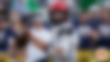 Cincinnati quarterback Desmond Ridder has led the Bearcats to a 12-0 record heading into Saturday's AAC Championship Game against Houston. (Darron Cummings / AP)