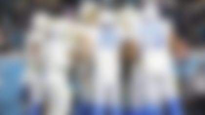 Los Angeles Chargers quarterback Justin Herbert (10) calls a play in the huddle during an NFL wild-card football game against the Jacksonville Jaguars, Saturday, Jan. 14, 2023, in Jacksonville,Fla. The Jaguars defeated the Chargers 31-30. (Logan Bowles via AP)