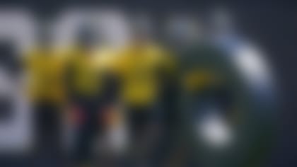 Pittsburgh Steelers cornerbacks watch as Joey Porter Jr., runs a drill during the NFL football team's OTA's in Pittsburgh Thursday, May 25, 2023. (AP Photo/Gene J. Puskar)