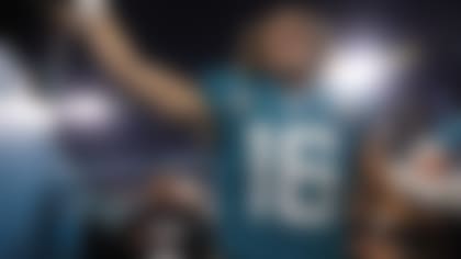 Jacksonville Jaguars quarterback Trevor Lawrence (16) smiles as he leaves the field following an NFL football game against the Tennessee Titans on Saturday, January 7, 2023 in Jacksonville, Florida. (Perry Knotts/NFL)