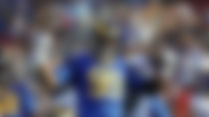 Los Angeles Rams defensive tackle Aaron Donald (99) celebrates after a tackle during an NFL football game against the Minnesota Vikings, Thursday, Sept. 27, 2018 in Los Angeles. (Ryan Kang/NFL)