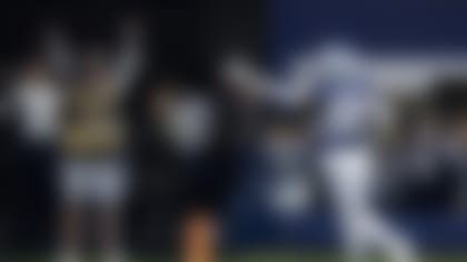 Dallas Cowboys cornerback DaRon Bland (26) runs back an interception for a touchdown during an NFL football game against the Los Angeles Rams, Sunday, Oct. 29, 2023, in Arlington, Texas. Dallas won 43-20. (AP Photo/Brandon Wade)