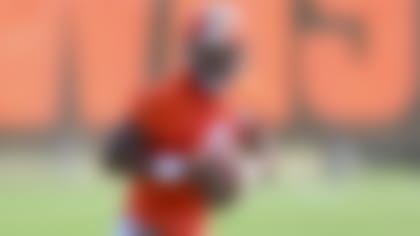 Cleveland Browns quarterback Deshaun Watson looks to pass during an NFL football practice in Berea, Ohio, Friday, July 29, 2022. (AP Photo/David Dermer)