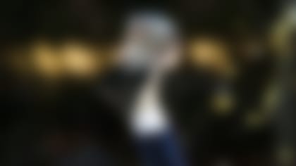 Denver Broncos General Manager and Executive Vice President of Football Operations John Elway (left) holds the Vince Lombardi trophy following the NFL Super Bowl 50 football game against the Carolina Panthers on Sunday, Feb. 7, 2016 at Levi's Stadium in Santa Clara, Calif. The Broncos won 24-10. (Ben Liebenberg via AP)