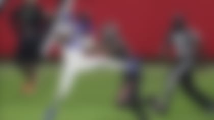 John Johnson -- playing for the Rams at the time -- breaks up a Tom Brady pass that escapes his grasp during a game in 2020. Johnson will have another chance to pick Brady off as a member of the Browns this season. (Mark LoMoglio/Associated Press)