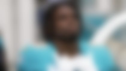 Miami Dolphins wide receiver Tyreek Hill (10) stands for the national anthem before an NFL football game against the Green Bay Packers Sunday, Dec. 25th, 2022 in Miami Gardens, Fla. (Brennan Asplen/Miami Dolphins via AP)