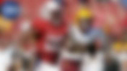 FILE - In this Sept. 30, 2017, file photo, Stanford running back Bryce Love, left, runs for a touchdown past Arizona State defensive back Demonte King (28) during the third quarter of an NCAA college football game in Stanford, Calif. Love established himself as a Heisman candidate early by rushing for 564 yards in back-to-back wins over UCLA and Arizona State. He kept adding to those numbers and leads all Power 5 running backs in yards rushing (1,973) yards per carry (8.3) and 100-yard games (11), and also set an FBS record with 12 runs of at least 50 yards. (AP Photo/Marcio Jose Sanchez, File)