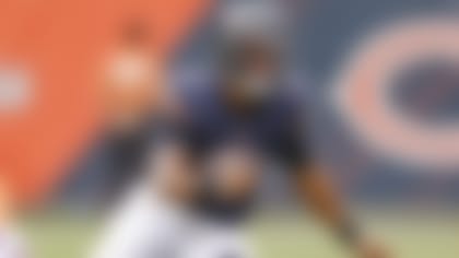 Chicago Bears quarterback Justin Fields (1) runs with the ball against the Buffalo Bills during the second half of a preseason NFL football game, Saturday, Aug. 21, 2021, in Chicago. (AP Photo/Kamil Krzaczynski)