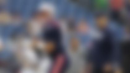 New England Patriots quarterback Mac Jones, left, sets to pass next to offensive coordinator Bill O'Brien, before the team's NFL preseason football game against the Houston Texans on Thursday, Aug. 10, 2023, in Foxborough, Mass. (AP Photo/Michael Dwyer)