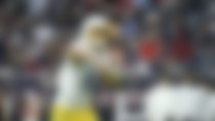 Los Angeles Chargers quarterback Justin Herbert throws a pass against the Houston Texans during the second half of an NFL football game Sunday, Dec. 26, 2021, in Houston. (AP Photo/Justin Rex)