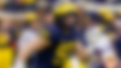 Michigan edge rusher Aidan Hutchinson is among the FBS leaders in sacks with 10 through the first 10 games of the 2021 season. (Carlos Osorio/AP)