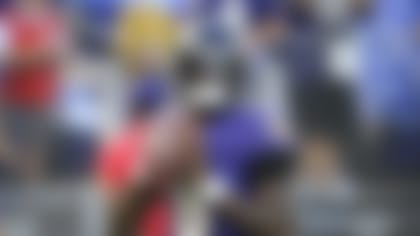 Baltimore Ravens quarterback Lamar Jackson works out prior to an NFL preseason football game against the New Orleans Saints, Saturday, Aug. 14, 2021, in Baltimore. (AP Photo/Nick Wass)