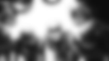 Midshipman quarterback Roger Staubach (12) of the U.S. Naval Academy team is shown in huddle during game with University of Pittsburgh October 26, 1963 at Annapolis, Md. Navy dropped Pitt from the ranks of unbeaten, 24-12. (AP Photo/Charles Gorry)