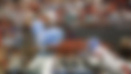 FILE - In this Oct. 7, 1991, file photo, Houston Oilers quarterback Warren Moon (1) throws a pass against the Denver Broncos during an NFL football game in Houston. Moon went undrafted after a stellar college career at Washington and was forced to play in Canada where he won two Grey Cup MVP awards in the CFL title game and was the most outstanding player in the league in 1983. He finally got his shot in the NFL the following year with Houston and went on to throw for 49,325 yards in a Hall of Fame career that would have been  even more prolific if he hadn't spent his first six seasons in Canada. (AP Photo, File)