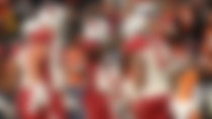 Arizona Cardinals running back James Conner (6) celebrates after scoring a touchdown against the Denver Broncos during the second half of an NFL football game, Sunday, Dec. 18, 2022, in Denver. (AP Photo/Jack Dempsey)