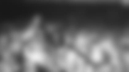 Jim Hines, anchor for the United States team in the 4 x 100 meter relay, is seen crossing the Olympic finish line to set a new world record of 38.2 seconds in Mexico City on Oct. 20, 1968. Behind him is Enrique Figuerola of Cuba. (AP Photo)