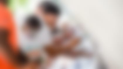 Miami Dolphins linebacker Jaelan Phillips (15) during Pollo Tropical art installation in NE tunnel at Hard Rock Stadium on Tuesday, Sept. 28, 2021 in Miami Gardens, Fla. (Carlos Goldman/Miami Dolphins via AP)