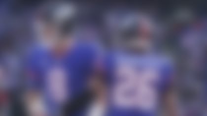 New York Giants' Saquon Barkley, right celebrates his touchdown with quarterback Daniel Jones during the first half of an NFL football game against the Washington Commanders, Sunday, Dec. 4, 2022, in East Rutherford, N.J. (AP Photo/John Minchillo)